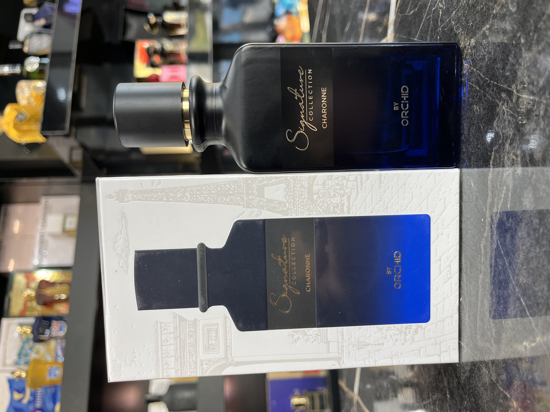 تصویر از عطر ادکلن ادوپرفیوم مردانه سیگنیچر کالکشن چارون  ارکید BY ORCHID SIGNATURE COLLECTION CHARONE EAU DE PARFUM 100 ML