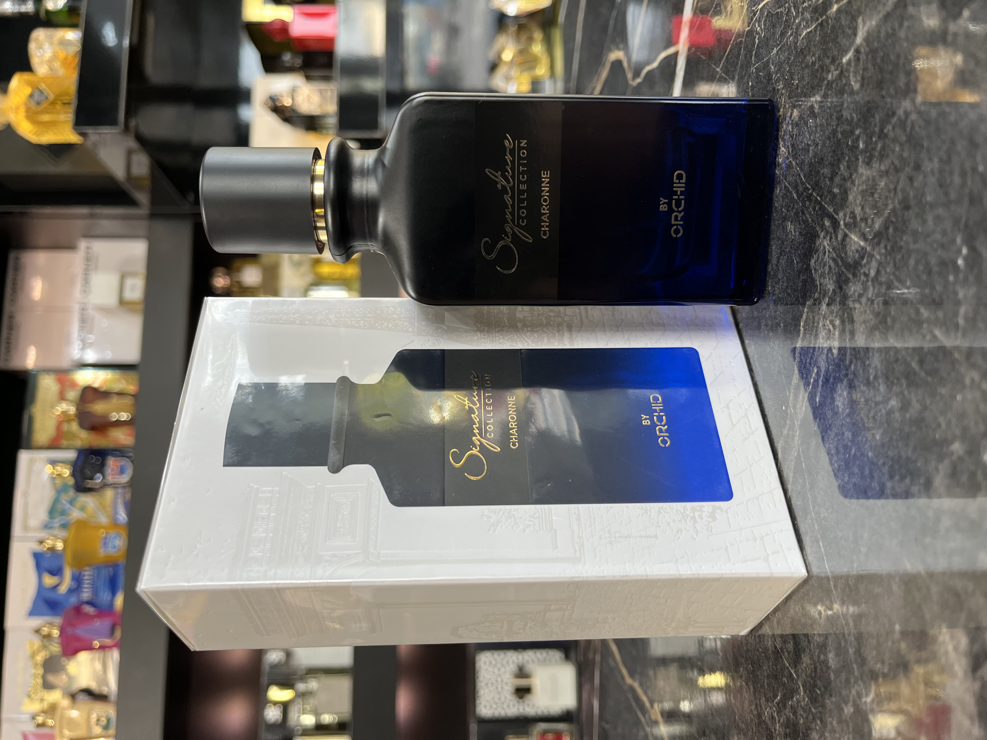 تصویر از عطر ادکلن ادوپرفیوم مردانه سیگنیچر کالکشن چارون  ارکید BY ORCHID SIGNATURE COLLECTION CHARONE EAU DE PARFUM 100 ML